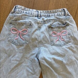 Light Blue High-Rise Flare Jeans with Pink Bow Pocket Embroidery